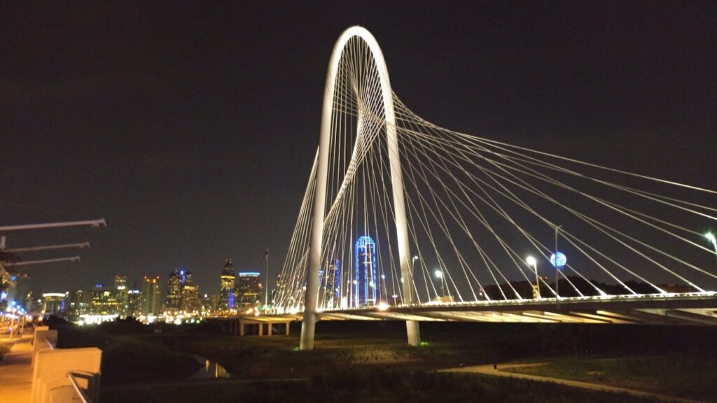 A night-time view of a bridge in Dallas, which is a popular city to get a Texas DSCR loan.