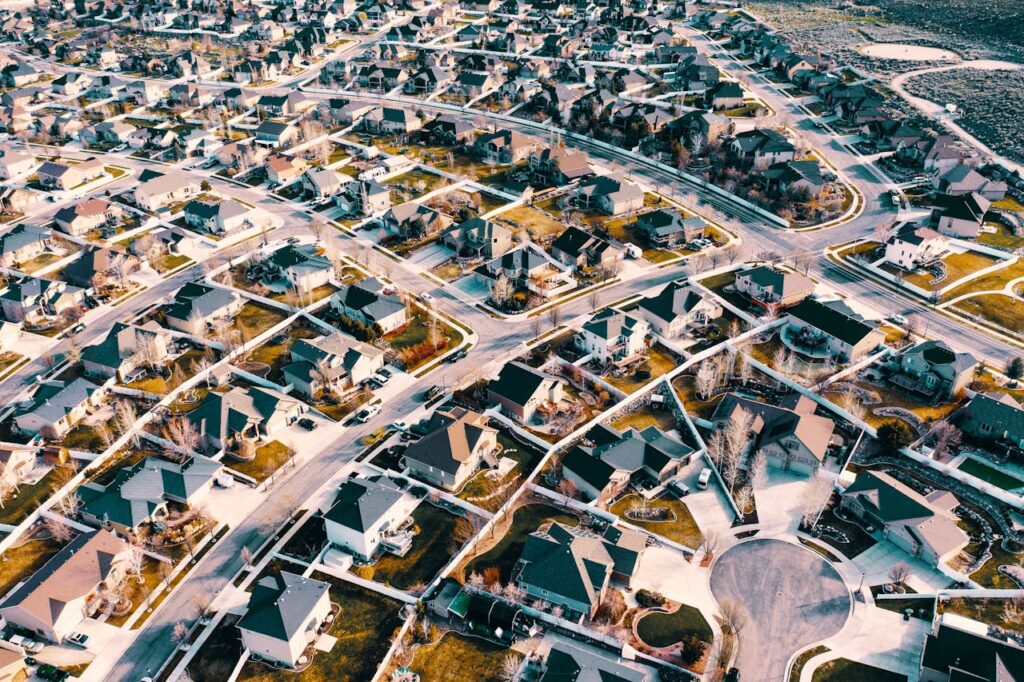 Mortgage Interest Rates: What Happens When They Drop? 1 An aerial view of a residential neighborhood, where home prices can be affected by interest rates.