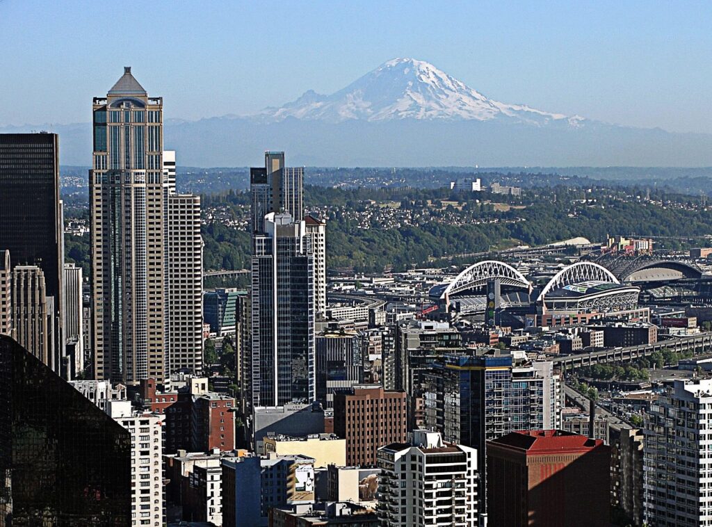 DSCR Loan Washington: Maximize ROI With Flexible Financing 3 Downtown Seattle, Washington with Mt. Rainier in the background.