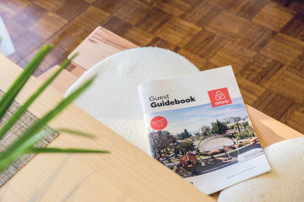 Short-Term vs. Long-Term Rentals – Which Strategy is Right for You? 1 short-term vs. long-term rentals: This photo compares the relative management difficulties by emphasizing a "Guest Guidebook"