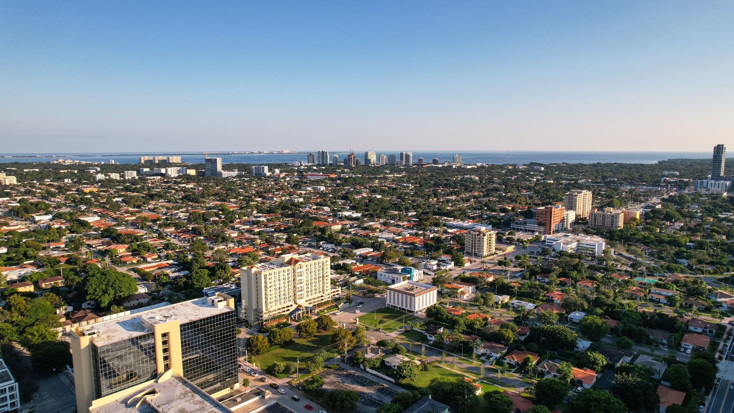 The Digital Deed 35 Aerial view of the Miami skyline and waterfront in sunlight